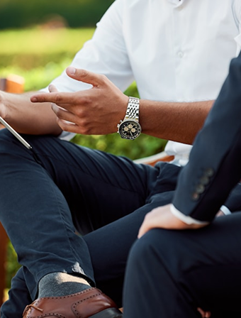 A consultant talking a client through project notes